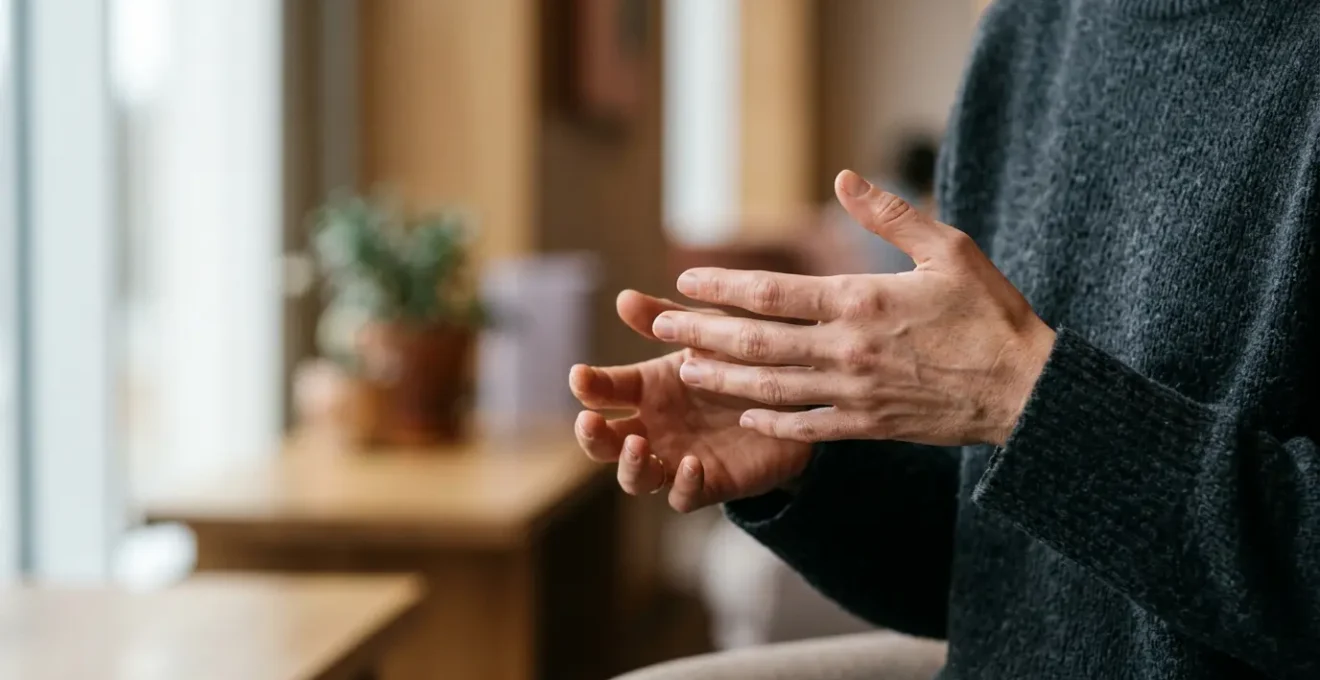 Close-up of hands in gentle motion during a brief mindfulness moment, emphasizing accessibility for restless minds