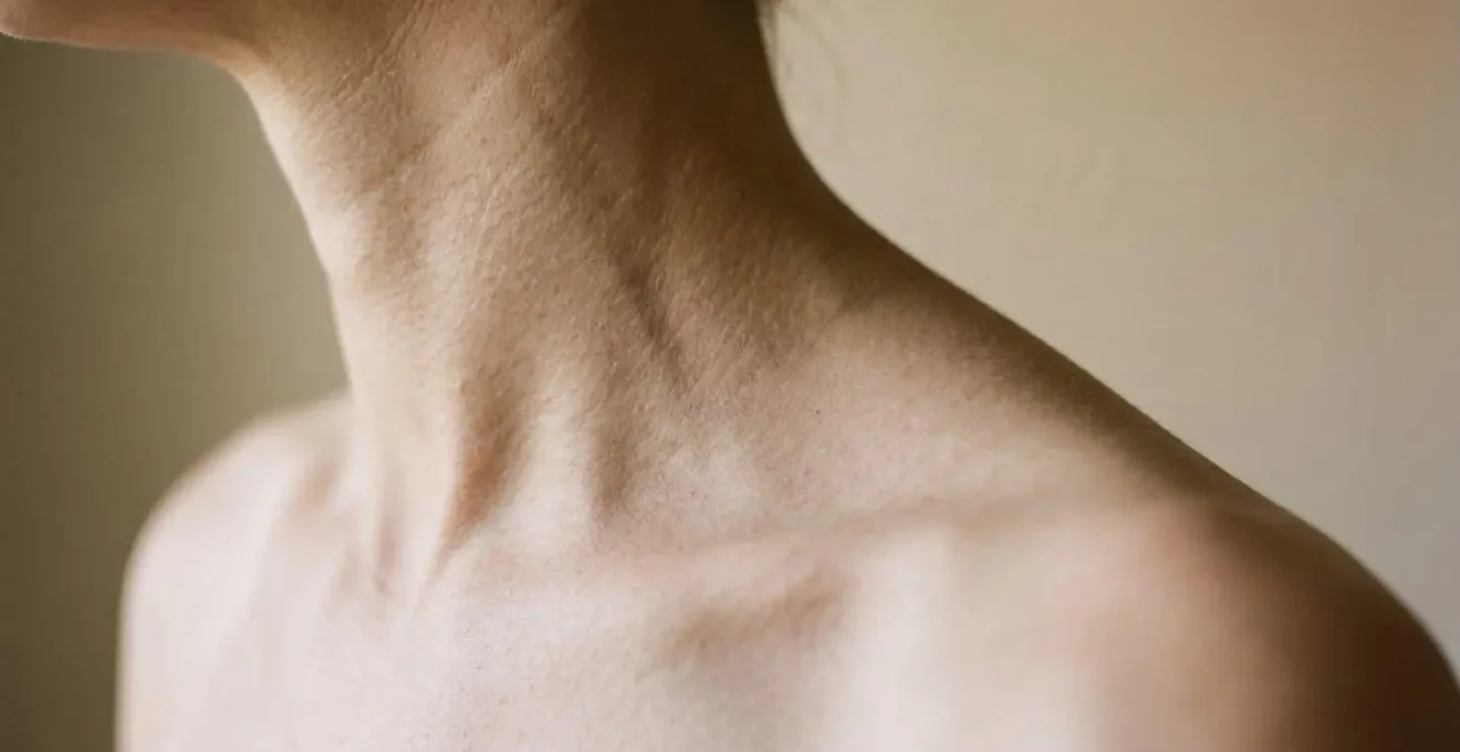 Extreme close-up detail of neck and shoulder alignment showcasing proper posture correction technique